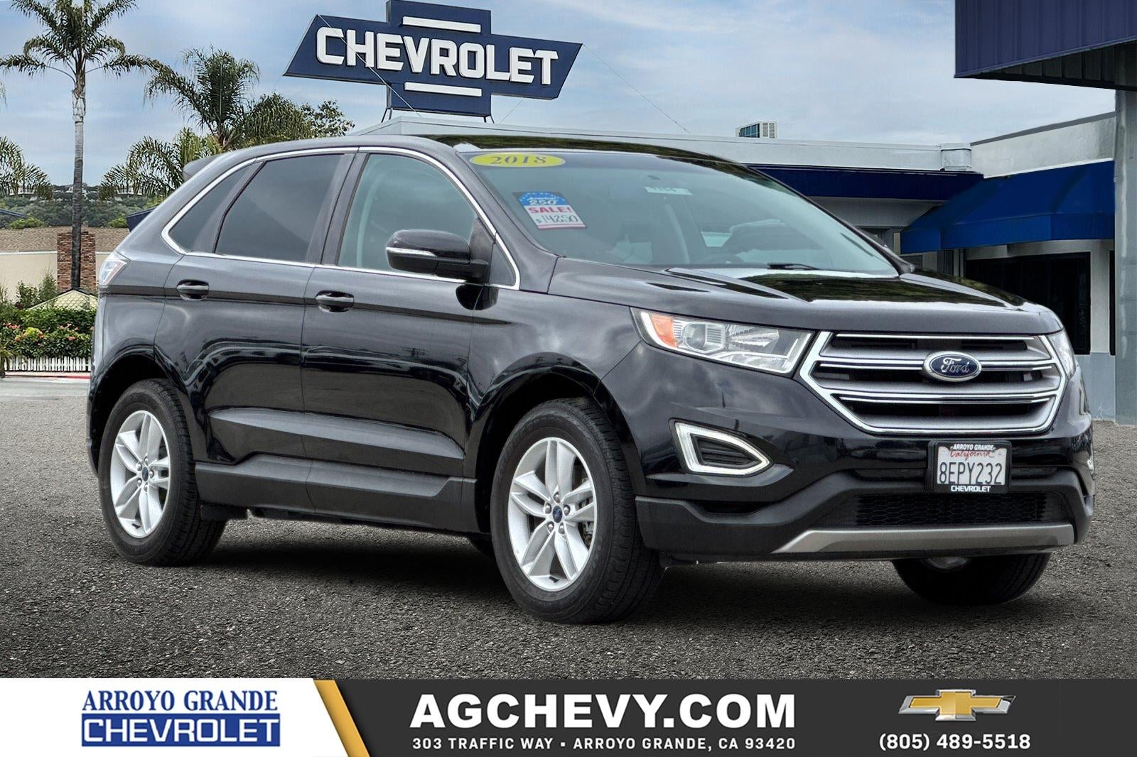 2018 Ford Edge SEL in Black — front three-quarter view